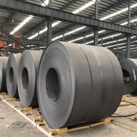 Hot rolled coil with dark mill scale, stacked on timber bearers in the warehouse